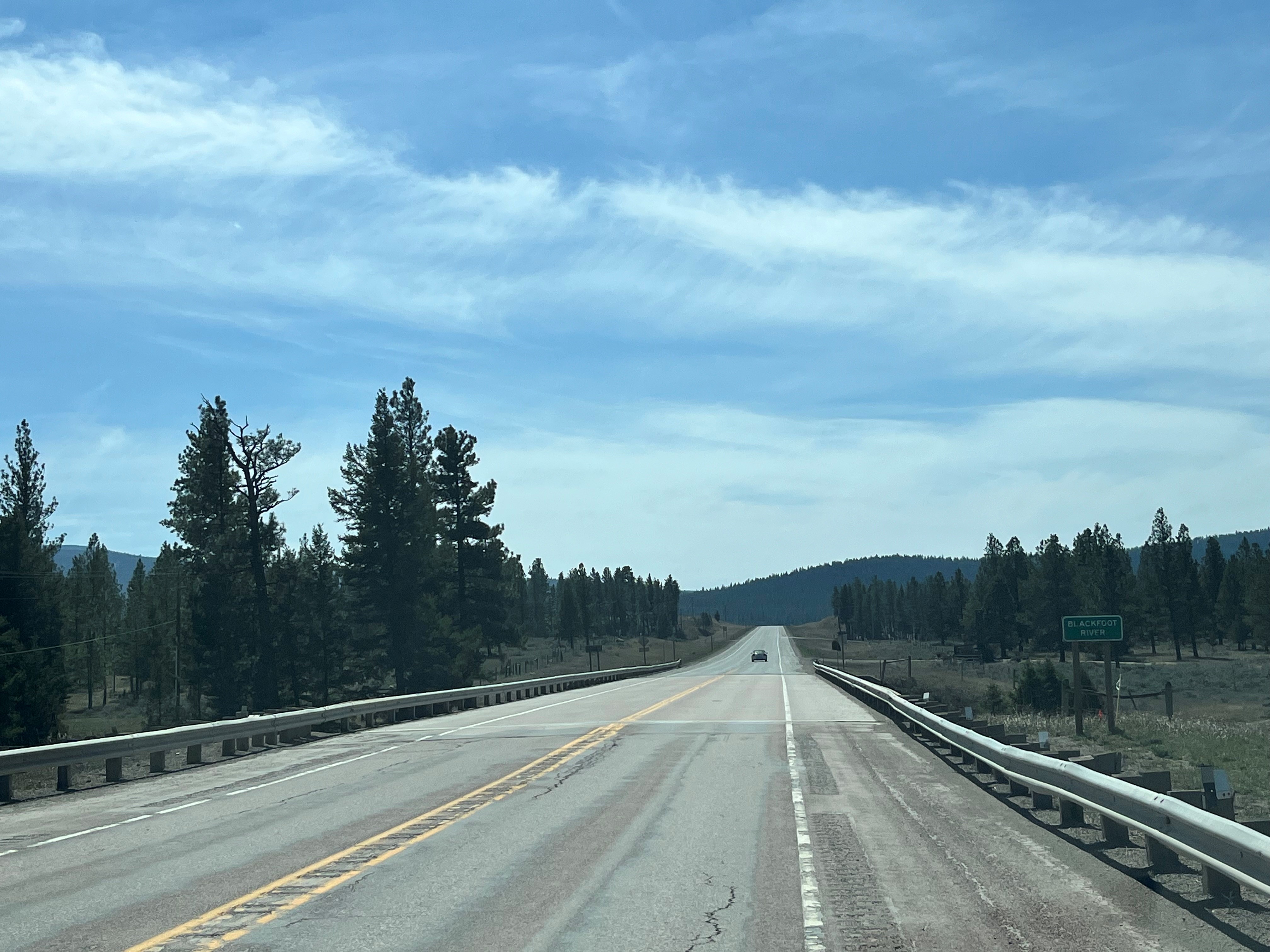 Photo of MT 200 near Greenough with mountains and trees in the background.