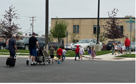 Children crossing the street on National Walk to School Day