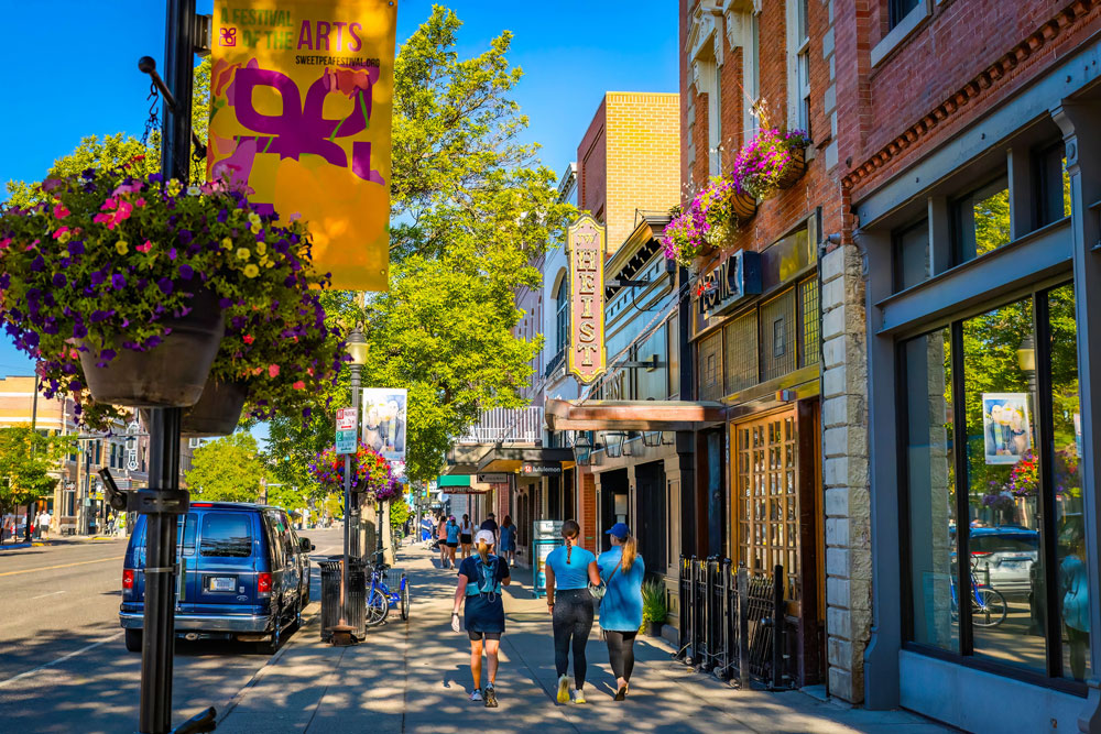 A beautiful street view of downtown Bozeman, Montana, on a warm summer evening